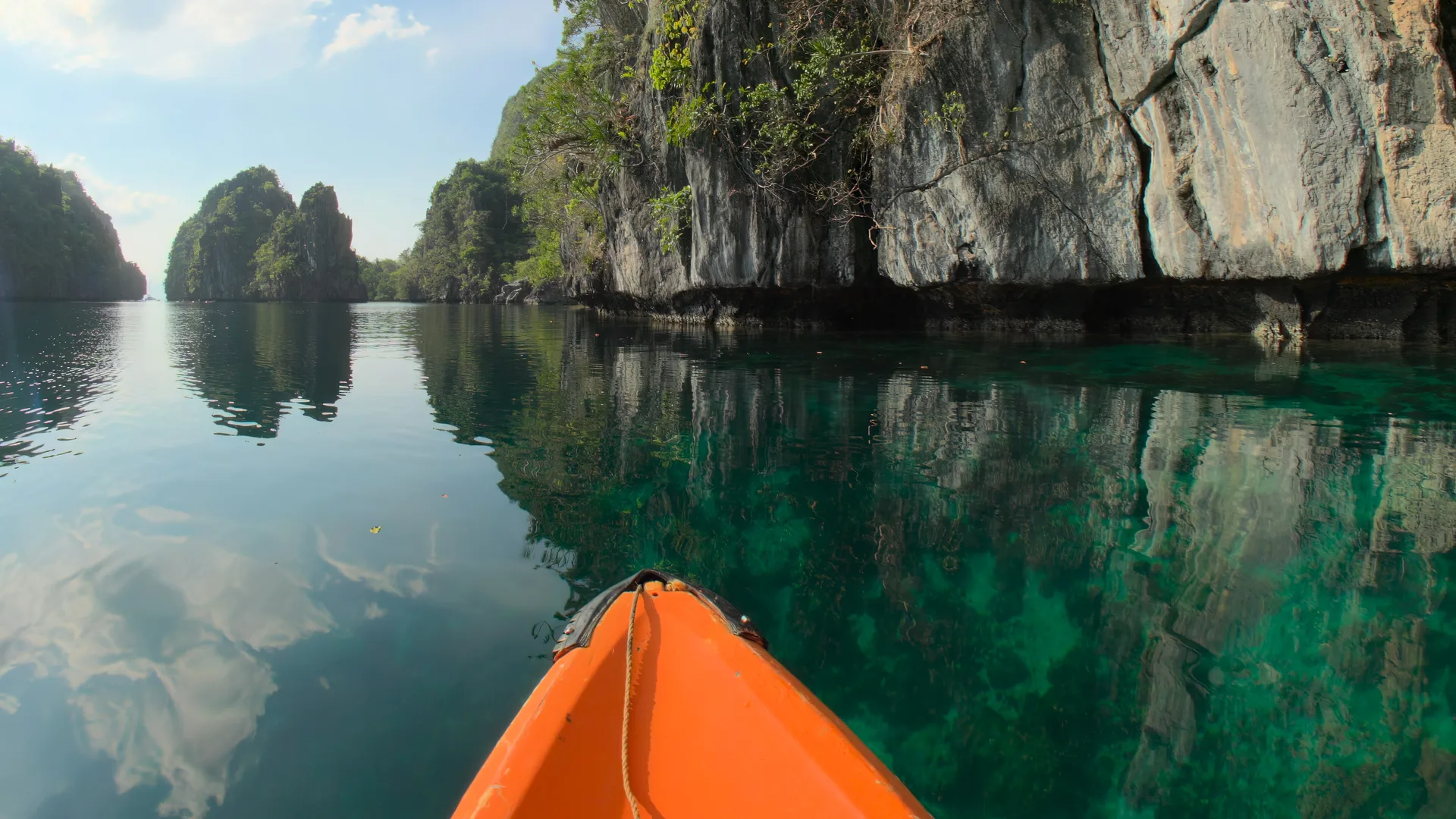 Kayak Under the Cliffs, El Nido, Palawan, Philippines